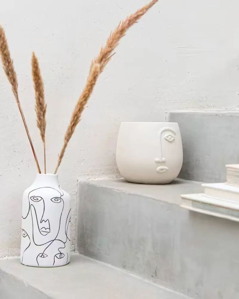 pot visage beton blanc